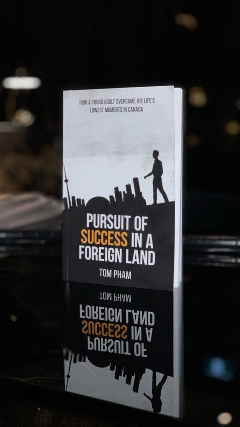 Pursuit of Success in a Foreign Land standing on a dark reflective table at night